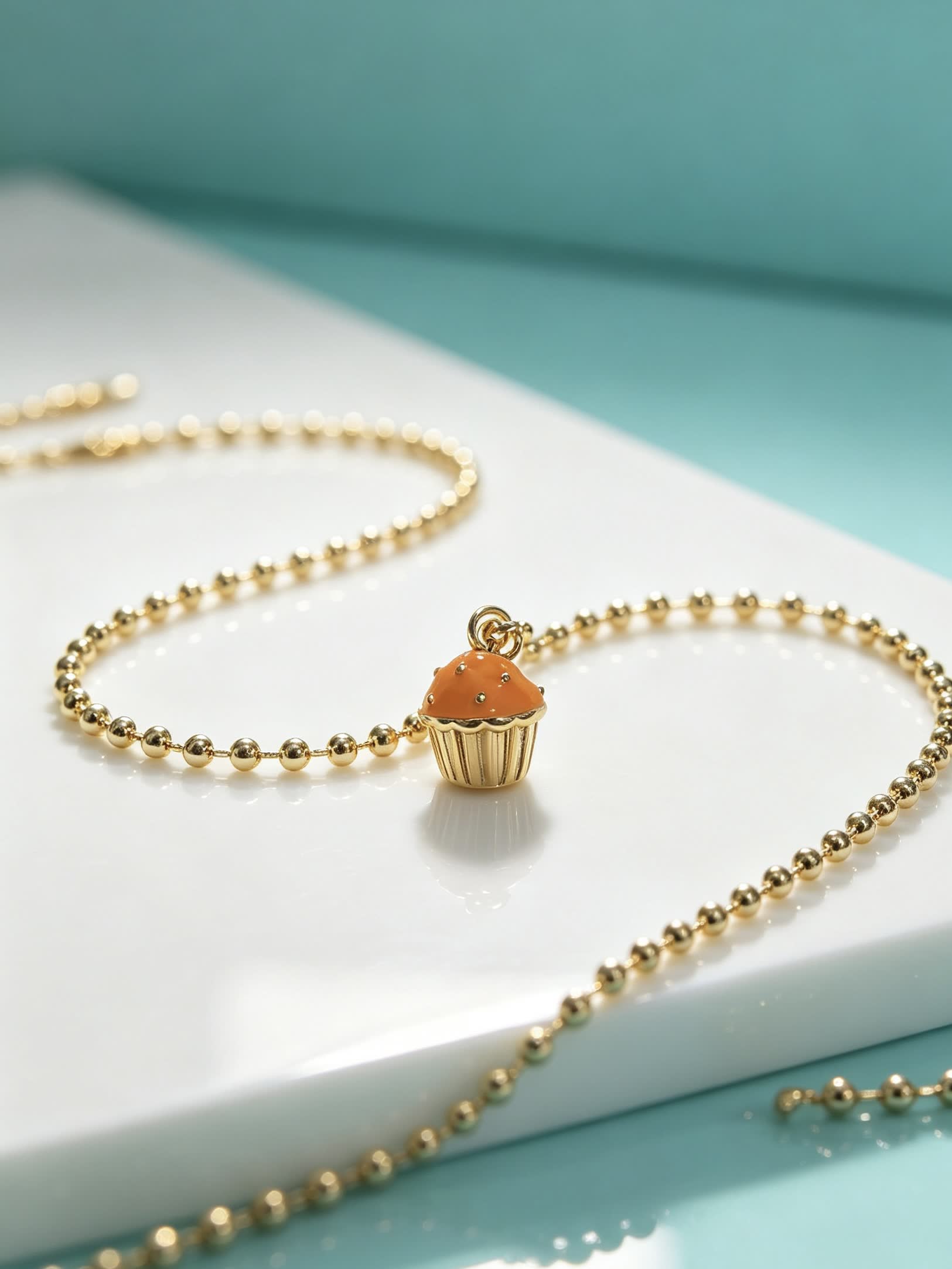 Tiffany & Co. Gold Bead Necklace with Cupcake Charm